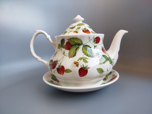 Théière sous tasse - et,