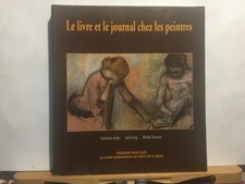LE LIVRE ET LE JOURNAL CHEZ