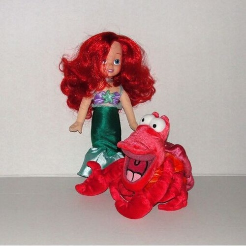 Peluche poupée petite - et,