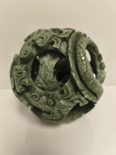 Sphère puzzle sculptée