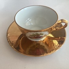 Tasse et soucoupe ave dorure -