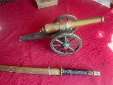 ancien canon en bois peint vert et doré fin XIXe 39 cm