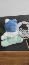 Doudou Ours bleu pyjama vert