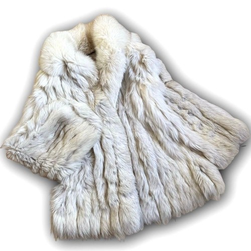 Manteau fourrure véritable