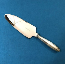 pelle à tarte coupante