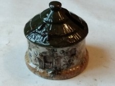 Ancienne tirelire ruche en faïence à casser