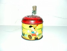 Petit moulin à musique pinoquilot ancien en bon état hauteur 6 cm.