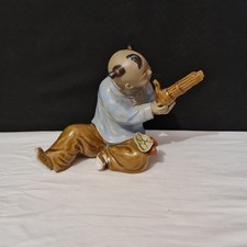 Statue ancienne en céramique