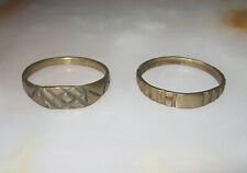 Deux bagues ou alliances réalisées avec des pièces de monnaie artisanat poilu.