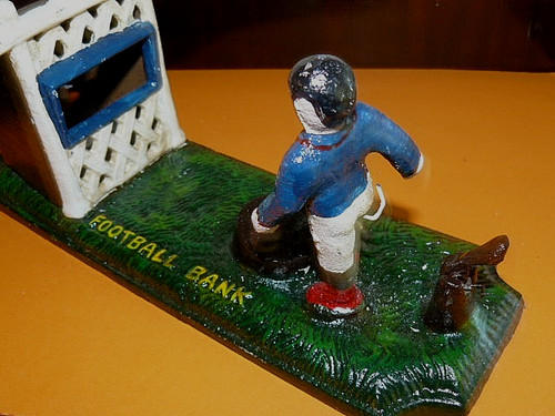 Tirelire fonte football - en,