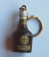 PORTE CLES publicitaire BOUTEILLE LIQUEUR DOM BENEDICTINE CACHET OR