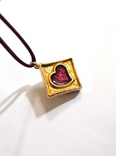 Yves Saint Laurent pendentif Concrète Opium Vintage