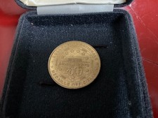 Médaille Officielle *