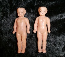 2 PETITES POUPEES FIXES en