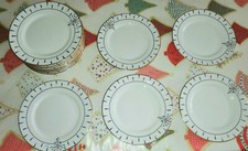 12 petites assiettes en porcelaine de limoges signées Paillet