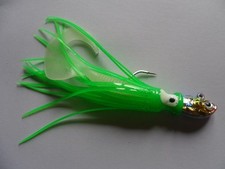 Jig avec calamar et twist 25g 13cm tête bleue corps vert twist phospho