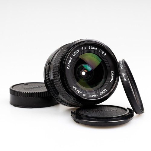 Mint canon 24mm 8 new - f, fd