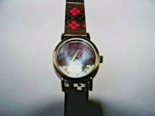 montre femme a quartz  avion