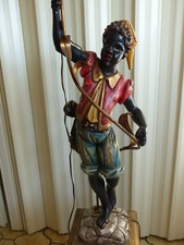 Nubien Porte Torchère en bois sculpté polychrome.