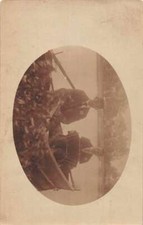 Men in Boat Playing Accordion Real Photo Vintage Postcard JJ649884