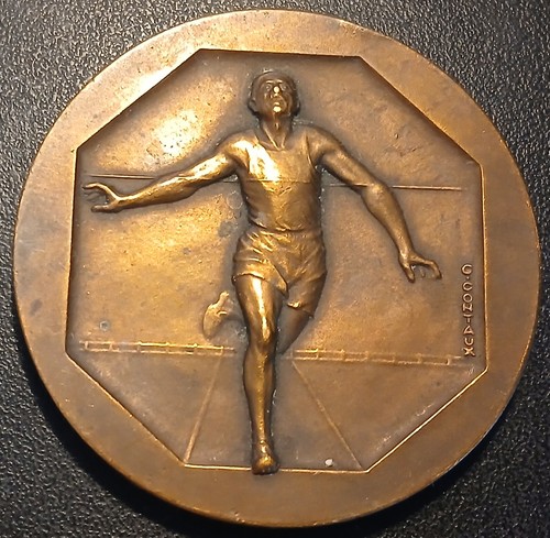 Médaille course à - -, pied