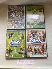 LOT DE 4 JEUX PC LES SIMS