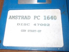 Quatre disquettes 3,5 " pour Amstrad PC 1640 non testées vendues en l'état