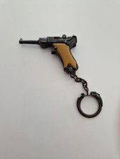 CADEAU PORTE CLÉ CLEF LUGER MINIATURE A PETARD JOUET ANCIEN AN 70