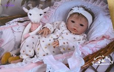 Très joli poupon de