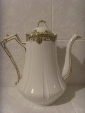 301- Ancienne cafetière porcelaine Limoges "Aux lions de faïence" Rue de Rivoli