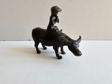 Ancienne Sculpture en bronze Asie Joueur de flute tibetain sur son Buffle