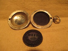 ancien tampon de voyage en forme de  montre à gousset début XX ème