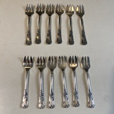 12  fourchettes à huître  métal argenté orfevre frionnet jamais utilisées