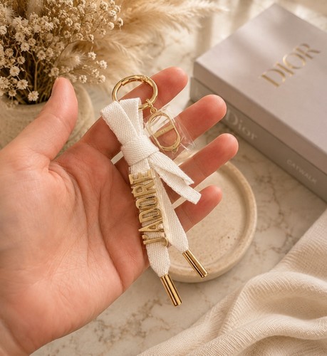 Dior charm porte clé - porte,