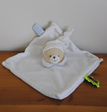 DOUDOU ET COMPAGNIE Plat Ours Tatoo Blanc Col Bord Bleu Dessous Rayé