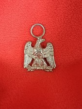Aigle impériale avec anneaux pour ruban doré*