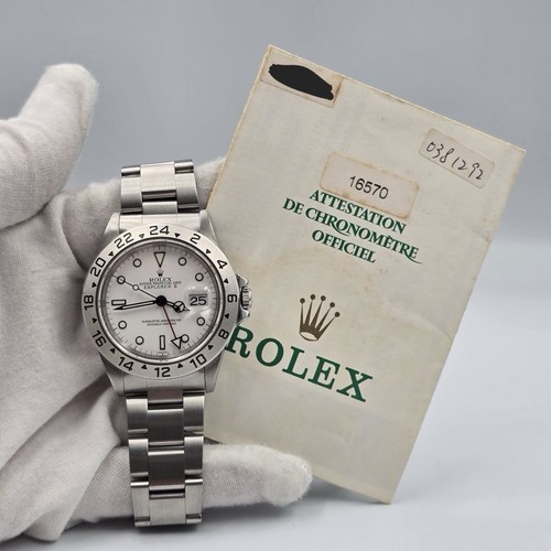 1999 papers rolex 16570 - 1999,