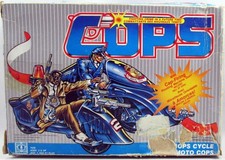 C.O.P.S. & Crooks - Blue Streak COPS Cycle / Torrent Bleu Moto COPS (Box Canada)