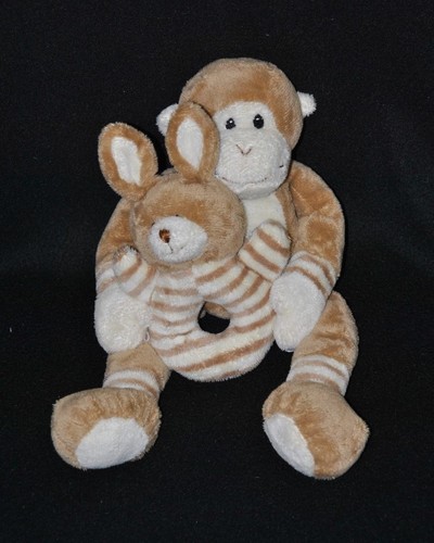 Peluche doudou singe tenant