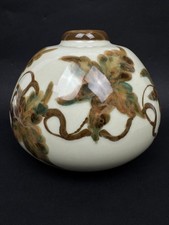 Vase boule en porcelaine de