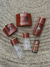Lot collection de 6 flacons de parfum Opium de Yves Saint Laurent vides.