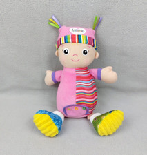LAMAZE Peluche doudou éveil bébé poupée rose TOMY 33 cm grelot bleu vert TTBE