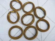 8 anciens anneaux de rideaux