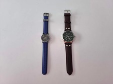 2 montres publicitaires -