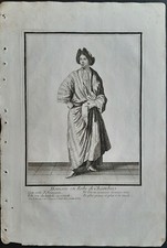 Homme en robe de chambre par