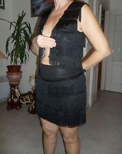 jupe et gilet trés chic et sexy couleur noir taille 38