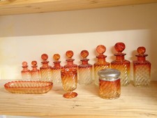 Service de toilette en cristal de Baccarat,bambou tord rouge.XIX°.Flacons parfum