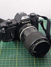 Appareil photo reflex Nikon EM avec objectif Nikkor NON TESTÉ
