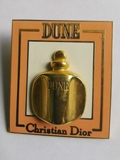 Pin's broche Dune Christian Dior 5x4,5 cm