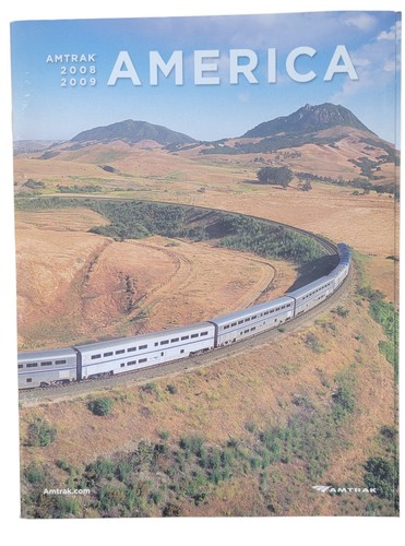 Amtrak traveling train rail - by,